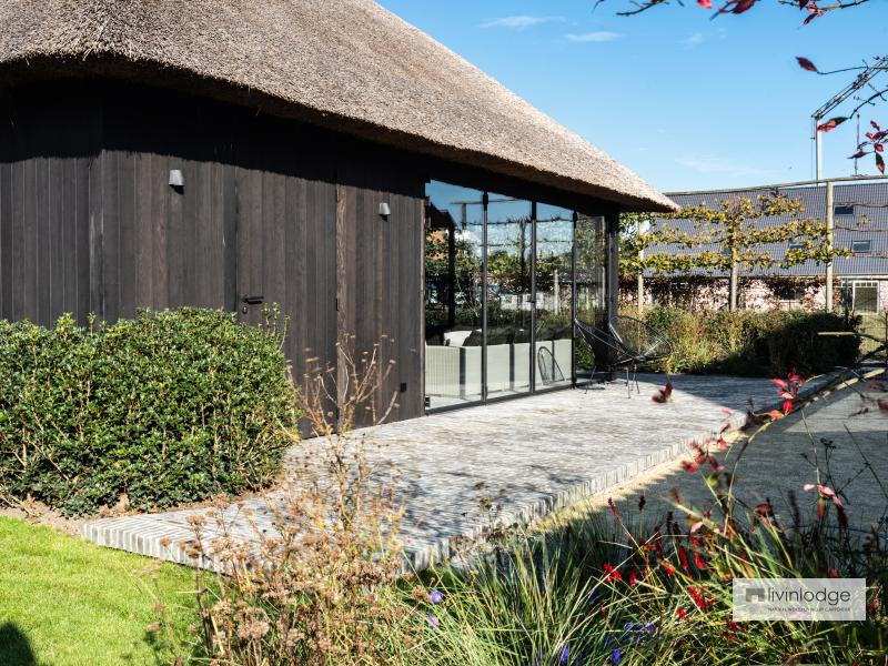 Eiken poolhouse met thermisch essen gevelbekleding De Haan Eiken poolhouse met thermisch essen gevelbekleding De Haan