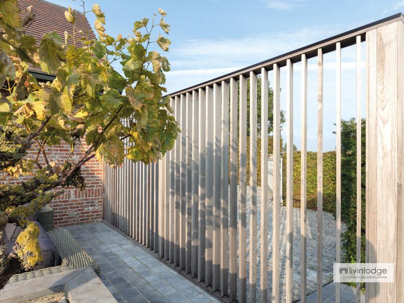 Moderne houten shutters als terrasafscheiding te Meulebeke | Houten shutters op maat Moderne houten shutters als terrasafscheiding te Meulebeke | Houten shutters op maat