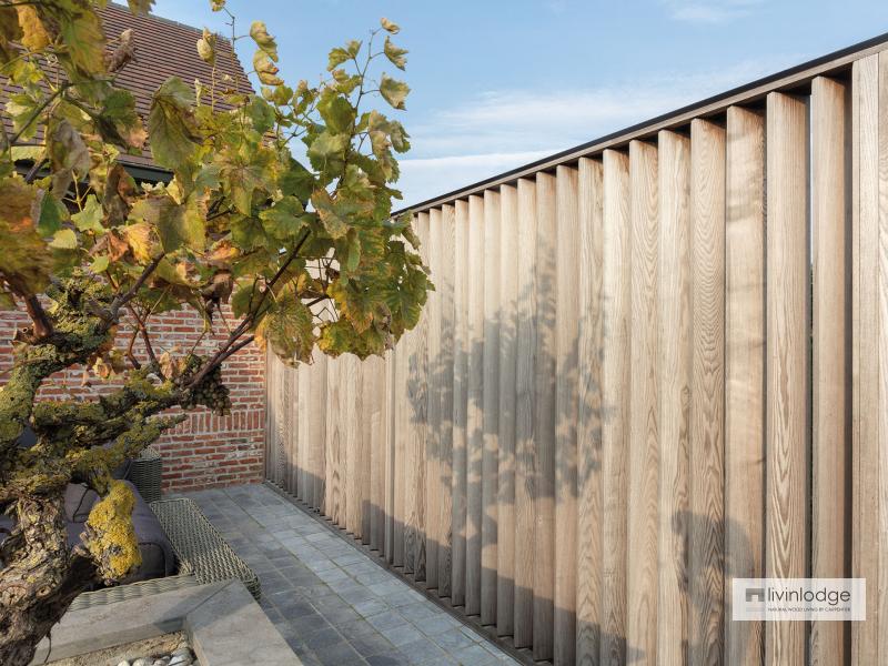Moderne houten shutters als terrasafscheiding te Meulebeke | Houten shutters op maat Moderne houten shutters als terrasafscheiding te Meulebeke | Houten shutters op maat