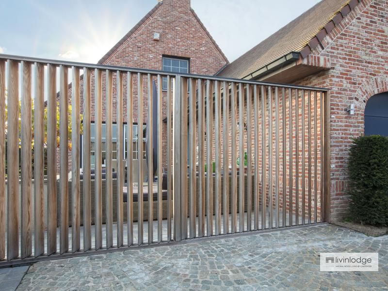 Moderne houten shutters als terrasafscheiding te Meulebeke | Houten shutters op maat Moderne houten shutters als terrasafscheiding te Meulebeke | Houten shutters op maat