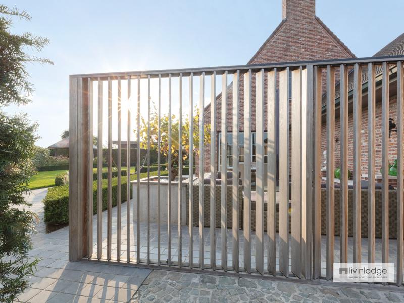 Moderne houten shutters als terrasafscheiding te Meulebeke | Houten shutters op maat Moderne houten shutters als terrasafscheiding te Meulebeke | Houten shutters op maat