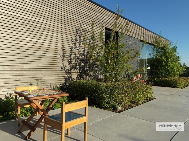 Polyvalente houten poolhouse met tuinberging te Waregem | Houten bijgebouwen op maat Polyvalente houten poolhouse met tuinberging te Waregem | Houten bijgebouwen op maat